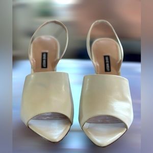 Nine West, White peep toe, sling back shoes.